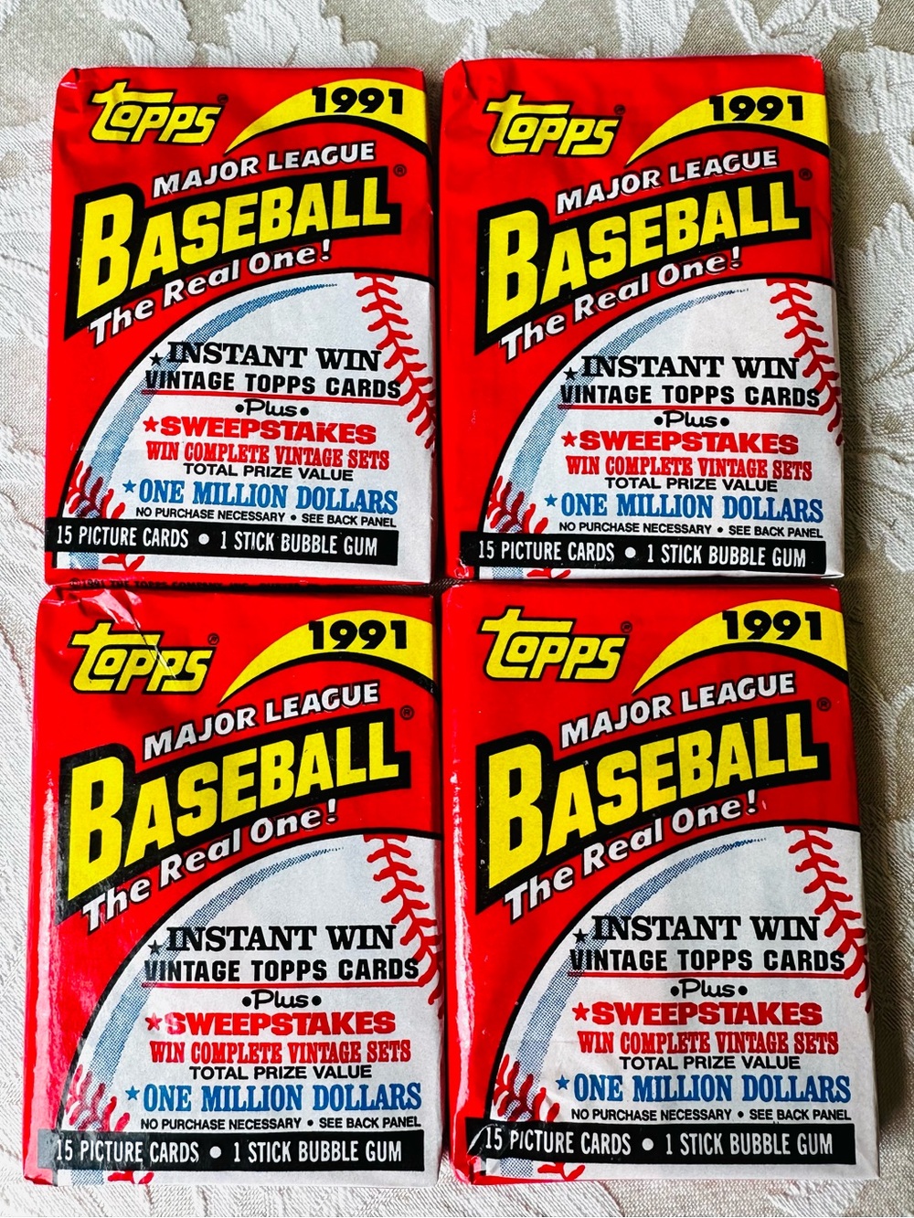 FOUR PACKS TOPPS 1991 MAJOR LEAGUE BASEBALL THE REAL ONE 15 PICTURE CARDS